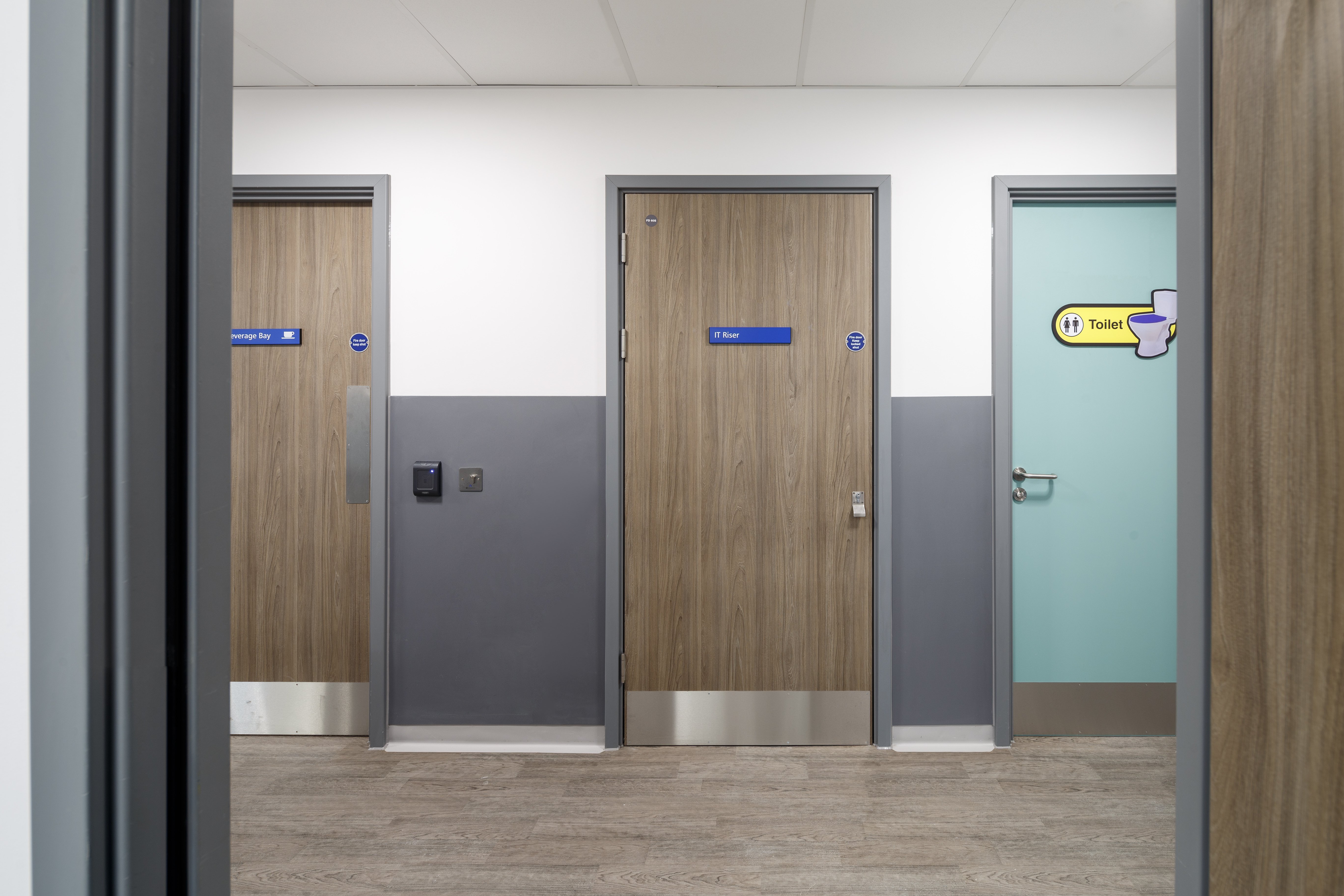 Hospital Corridor Showing Various Doors